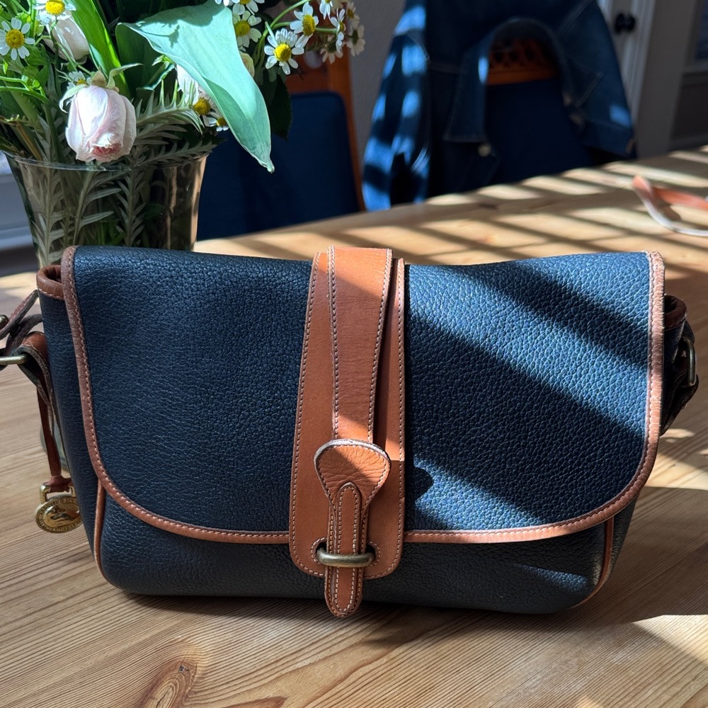 Vintage All Weather Leather Dooney & Bourke Black and Tan Leather Bag.